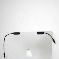 Underside of Sunman solar panel showing rear-mounted junction boxes and cables