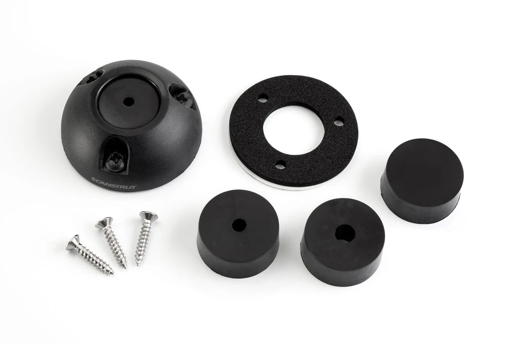 Kit components including black shell, foam gasket, rubber bungs and screws