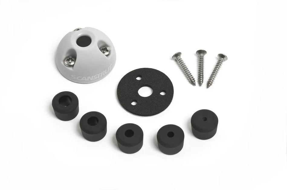 Exploded kit view showing seal shell, multiple bungs, base gasket, and mounting screws