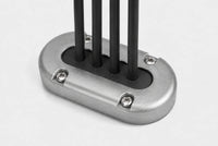 Aluminium vertical multi cable seal with four cables passing through a black rubber bung