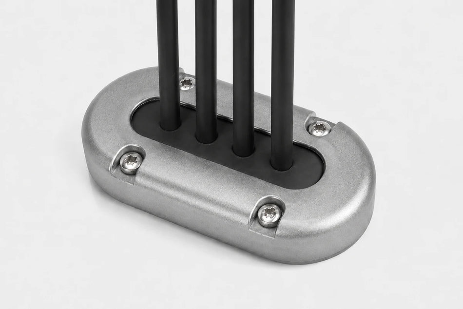 Aluminium vertical multi cable seal with four cables passing through a black rubber bung