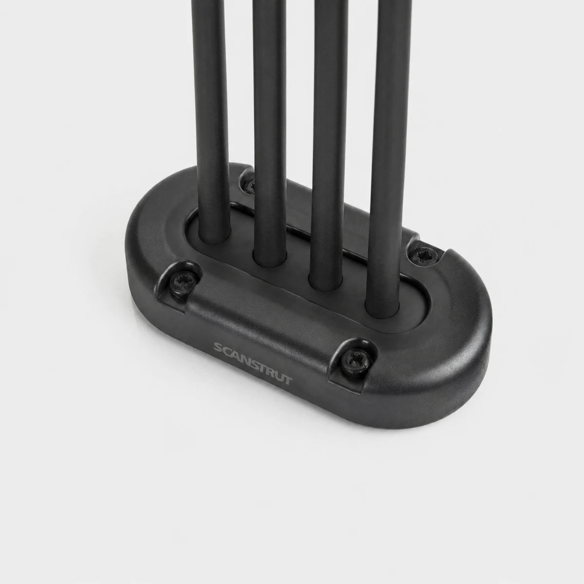 Black multi cable seal with four black cables passing through a vertical waterproof entry