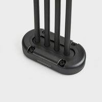 Black multi cable seal with four black cables passing through a vertical waterproof entry