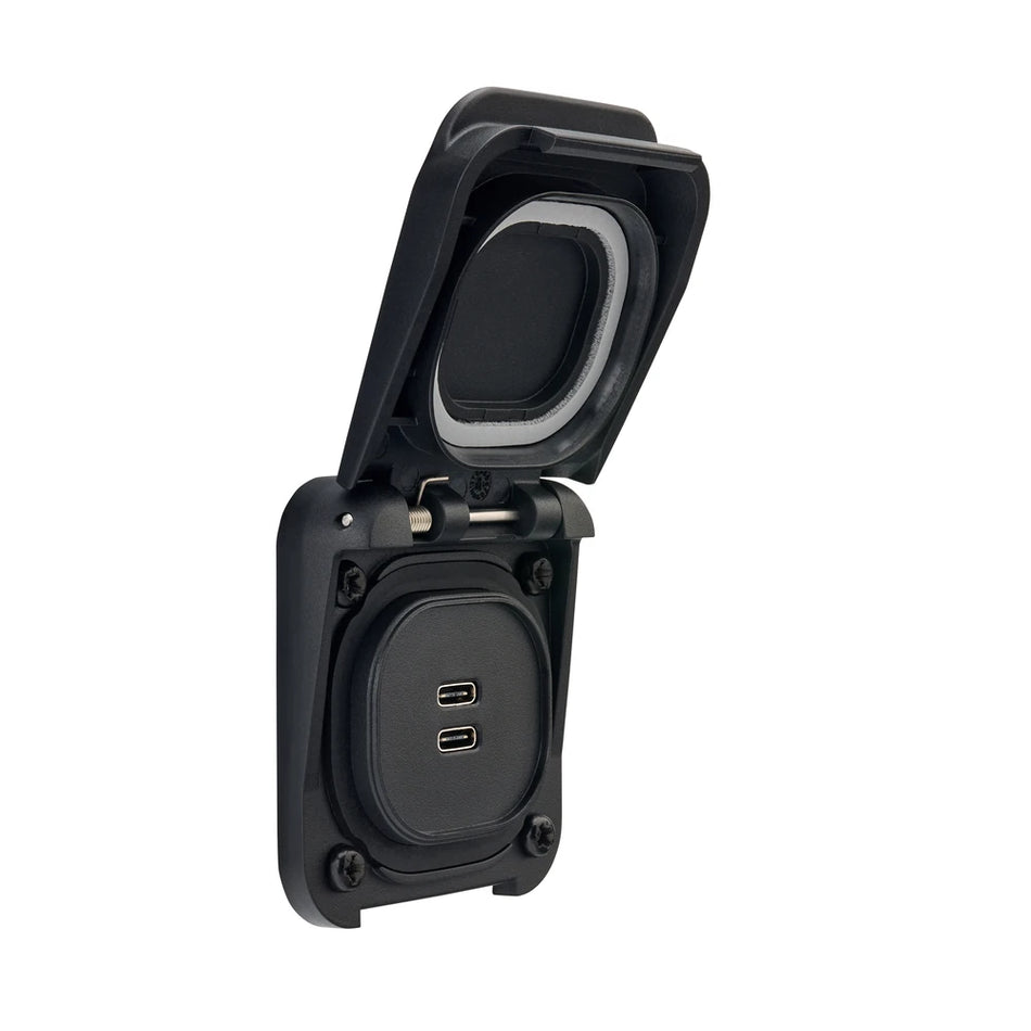 Front view of dual USB-C socket with black protective flip lid open showing charging ports