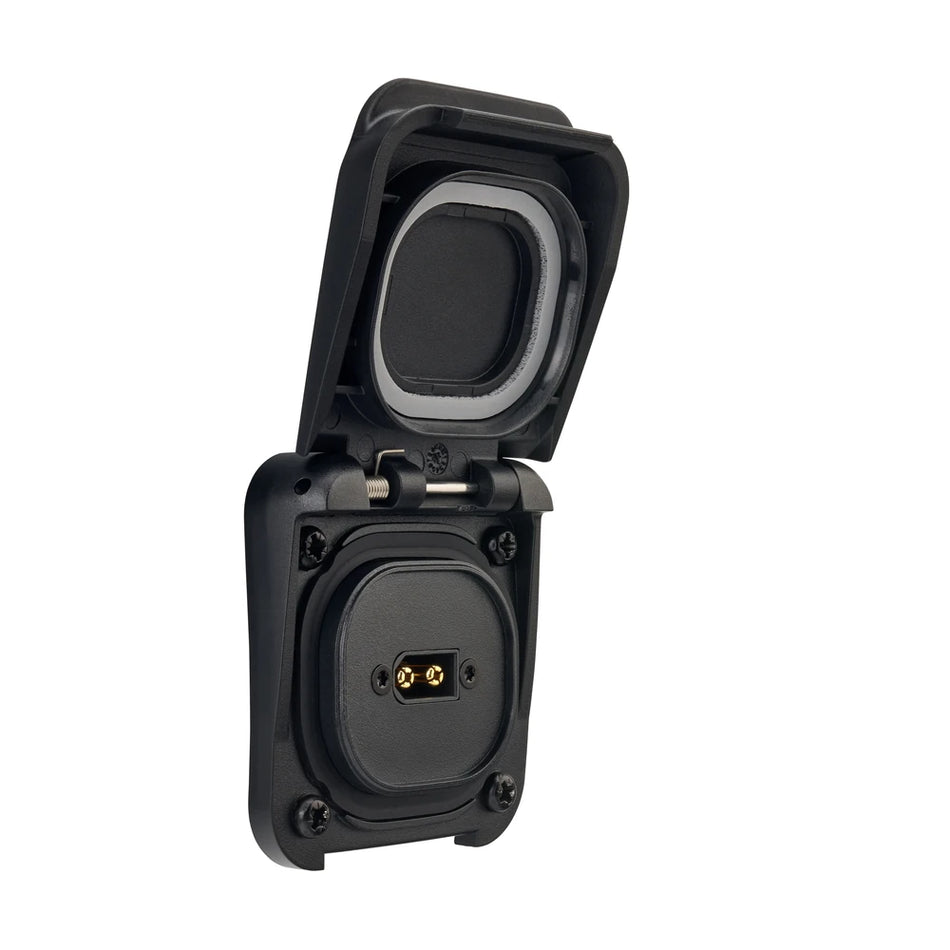 Three-quarter view of black Scanstrut solar input socket with open lid revealing internal XT60 connector