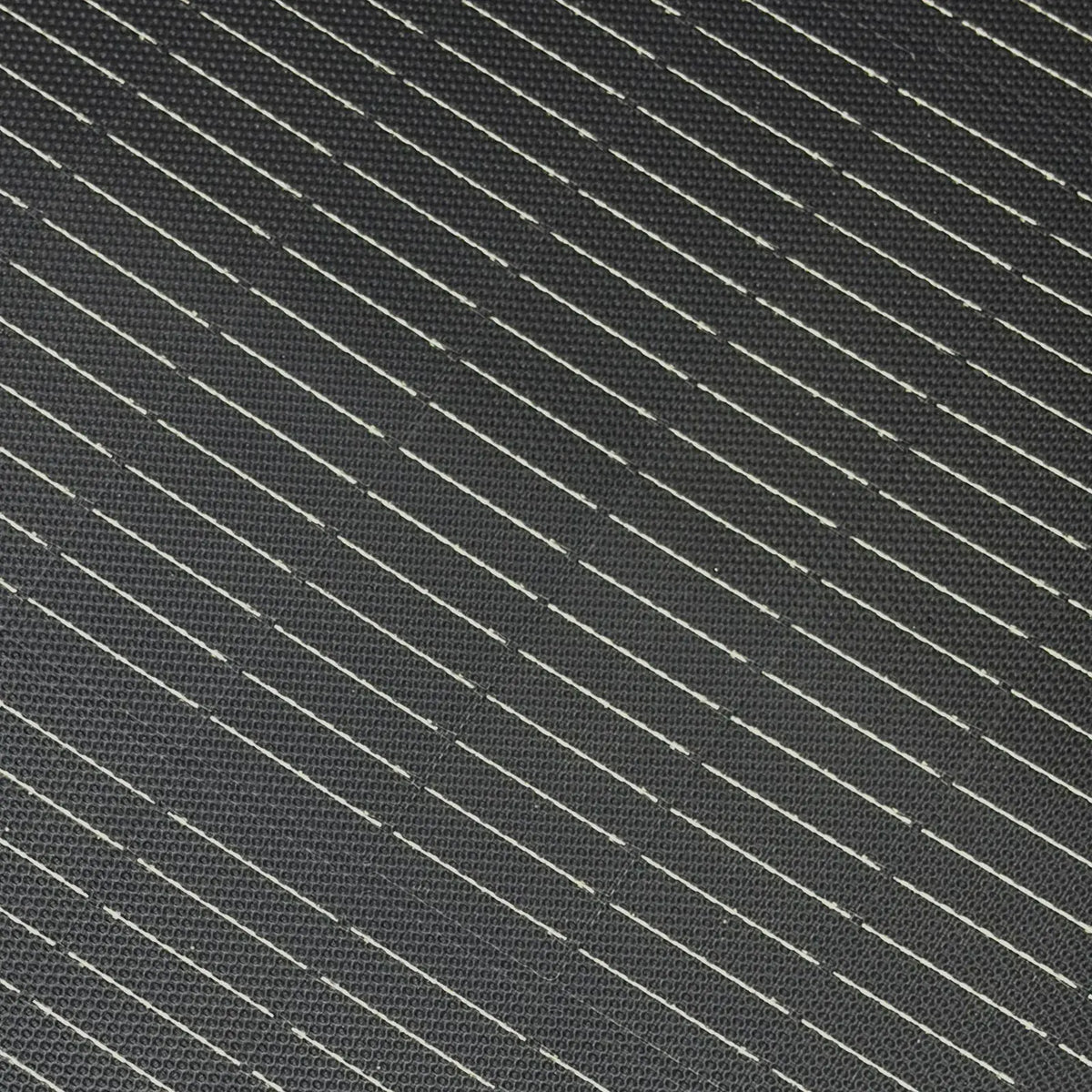 Extreme close-up of the textured solar cell surface and grid lines