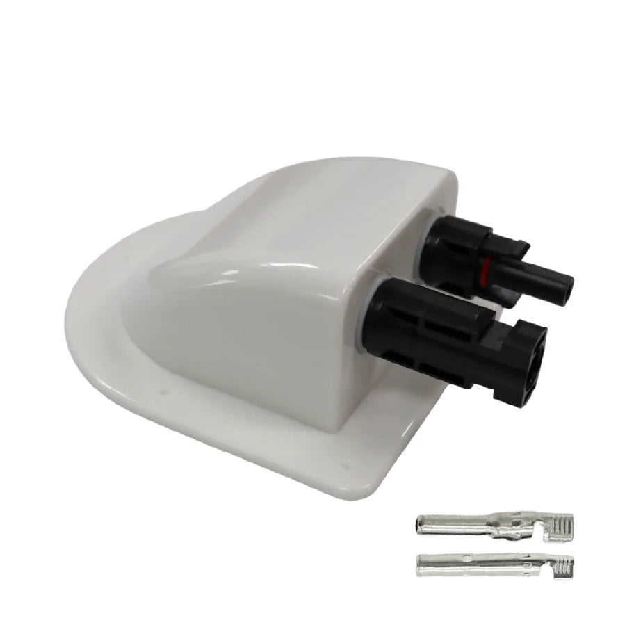 Angled view of white solar cable entry cover with integrated black connectors and loose crimp terminals