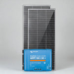 Two 220W solar panels and a blue Victron SmartSolar MPPT 100/30 charge controller