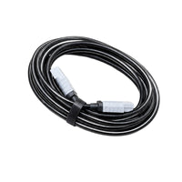 Coiled black extension cable with grey high-current Anderson-style plugs at both ends