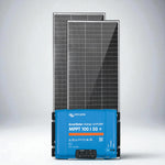 Two 250W solar panels upright behind a blue Victron SmartSolar MPPT 100/50 charge controller