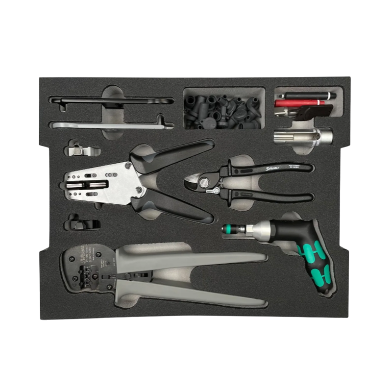 Top-down view of Stäubli MC4 toolset foam insert with crimping and stripping pliers