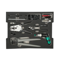 Top-down view of Stäubli MC4 toolset foam insert with crimping and stripping pliers
