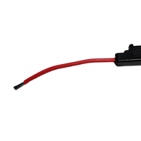 Detail view of stripped red cable insulation showing tinned copper strands