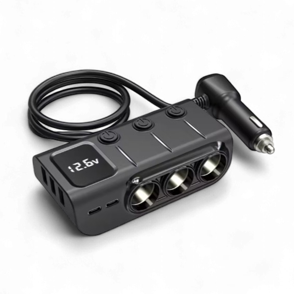 Studio shot of car adaptor showing digital display reading 12.6v and cable layout