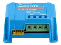 Detail view of the green terminal block and yellow blade fuse for circuit protection