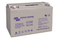Angled view of a grey Victron 12V 110Ah AGM deep cycle battery showing top terminals