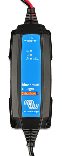 Close-up of Victron charger interface showing 6V and 12V indicators and Bluetooth logo