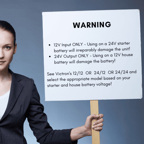 Warning sign detailing 12V input and 24V output requirements for the charger