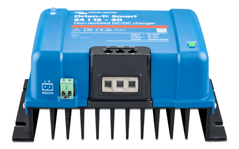 Front view of charger terminals with dust cover and remote on/off plug visible