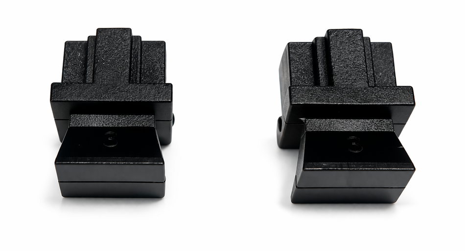 Two black textured plastic RJ45 dust covers for CANBus ports