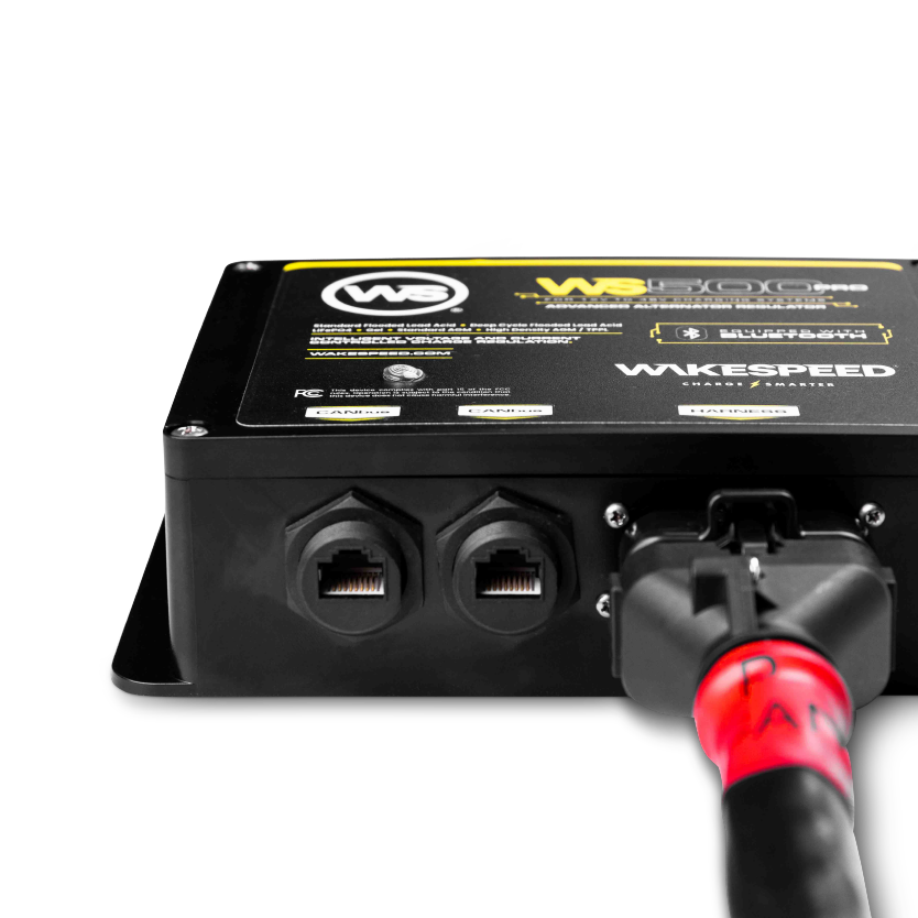 Bottom perspective of the regulator with CANbus ports and a connected wiring harness