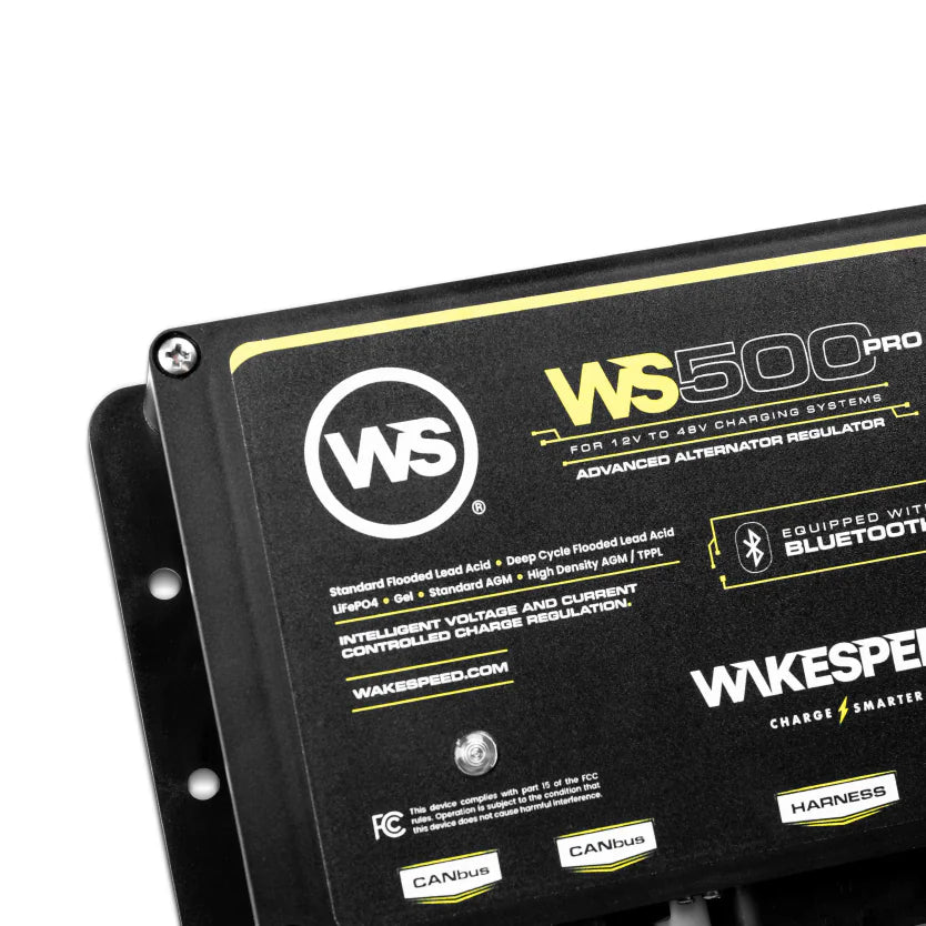 Close-up of the top-left mounting screw and Wakespeed logo on the regulator casing