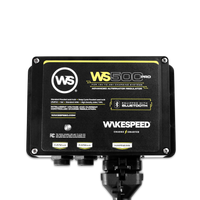 Wakespeed WS500 Pro alternator regulator with wiring harness attached on black background