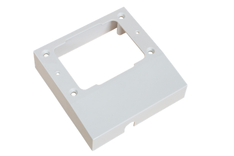 White plastic mounting spacer for C Type GPO with central cutout and pre-drilled mounting holes